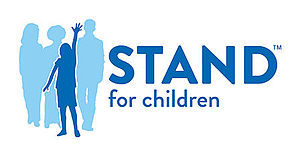 STAND logo with child raising hand high